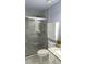 Bathroom with a modern glass-enclosed shower and sleek vanity at 3315 Haverhill Rowe, Lawrenceville, GA 30044
