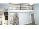 Entryway with soaring ceilings, adjacent kitchen, and a staircase leading to the second story at 3315 Haverhill Rowe, Lawrenceville, GA 30044