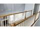 Bright foyer view shows the staircase and living room with a fireplace and updated floors at 3315 Haverhill Rowe, Lawrenceville, GA 30044