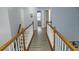 Upstairs hallway area with light grey vinyl plank flooring and light blue walls at 3315 Haverhill Rowe, Lawrenceville, GA 30044