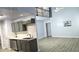 Modern kitchen featuring stylish gray cabinetry, light countertops, and stainless steel appliances at 3315 Haverhill Rowe, Lawrenceville, GA 30044