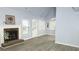 Bright living room features vaulted ceilings, fireplace, and wood-look flooring at 3315 Haverhill Rowe, Lawrenceville, GA 30044