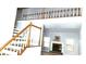 Spacious living room with a fireplace, staircase, and abundant natural light at 3315 Haverhill Rowe, Lawrenceville, GA 30044