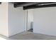 Unfinished basement featuring concrete floors, white painted walls and ceiling with open utilities at 4011 Lake Carlton Rd, Loganville, GA 30052