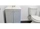 Modern bathroom sink vanity featuring shaker style cabinet doors and chrome faucet at 4011 Lake Carlton Rd, Loganville, GA 30052