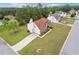 Beautiful two-story home with a red roof, well-manicured lawn, and attached two car garage at 6932 Dalehollow Dr, Lithonia, GA 30058