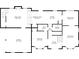 Detailed floor plan of the first floor, including kitchen, living spaces, garage, and bedroom at 6932 Dalehollow Dr, Lithonia, GA 30058