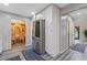 Spacious kitchen area leading to dining room with chandelier at 6932 Dalehollow Dr, Lithonia, GA 30058