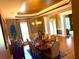 Elegant dining room with a coffered ceiling, chandelier, and hardwood floors at 7550 Star Magnolia, Lithonia, GA 30058