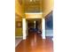 Stunning foyer with wood floors, soaring ceilings, and decorative columns at 7550 Star Magnolia, Lithonia, GA 30058