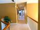 Bright hallway features carpeted floors and views to multiple rooms at 7550 Star Magnolia, Lithonia, GA 30058