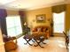 Bright living room with comfortable seating, natural light, and stylish décor at 7550 Star Magnolia, Lithonia, GA 30058