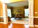 Cozy living room featuring decorative columns, neutral tones, and ample natural light at 7550 Star Magnolia, Lithonia, GA 30058