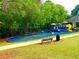 Community playground with colorful equipment and a soft surface, providing a safe and fun environment for children to play at 7550 Star Magnolia, Lithonia, GA 30058