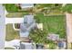 Aerial view of a home with a spacious backyard, garden, and privacy fence at 1130 Lochshyre Way, Lawrenceville, GA 30043