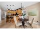 Eat-in kitchen features wood cabinets, granite counters, and stainless appliances at 1130 Lochshyre Way, Lawrenceville, GA 30043