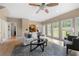 Bright and airy living room with hardwood floors and modern furnishings at 1130 Lochshyre Way, Lawrenceville, GA 30043