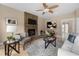 Comfortable living room with stone fireplace at 1130 Lochshyre Way, Lawrenceville, GA 30043