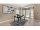 Bright office space with bay window, hardwood floors, and modern decor at 1130 Lochshyre Way, Lawrenceville, GA 30043