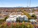 Overhead view of apartment complex with a community pool in a wooded surrounding at 130 Arizona Ne Ave # 104, Atlanta, GA 30307