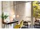 Charming balcony with lots of natural light and view of the surrounding landscape at 130 Arizona Ne Ave # 104, Atlanta, GA 30307