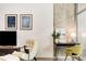 Chic living room nook featuring hardwood floors, concrete walls, and lots of natural light at 130 Arizona Ne Ave # 104, Atlanta, GA 30307