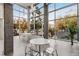 Modern lobby with floor to ceiling windows, lots of natural light, and views of the landscaped exterior at 130 Arizona Ne Ave # 104, Atlanta, GA 30307