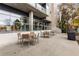Outdoor patio area with tables and chairs, perfect for lounging and enjoying the outdoors at 130 Arizona Ne Ave # 104, Atlanta, GA 30307