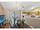 Dining area adjacent to the kitchen with a door that leads to the deck at 1358 Stoneleigh Way, Stone Mountain, GA 30088