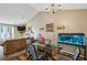 Open concept living space with dining area and living room with vaulted ceiling at 1358 Stoneleigh Way, Stone Mountain, GA 30088