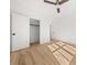 Spacious bedroom with hardwood floors, closet, and natural light at 2032 Spink Nw St, Atlanta, GA 30318