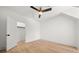 Bright bedroom with hardwood floors, closet, and neutral color palette at 2032 Spink Nw St, Atlanta, GA 30318