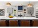 Stylish kitchen features a large island, stainless steel appliances, and custom cabinetry at 2032 Spink Nw St, Atlanta, GA 30318