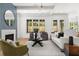 Inviting living room features stylish decor, hardwood floors, and plenty of natural light at 2032 Spink Nw St, Atlanta, GA 30318