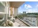 Cozy covered balcony with seating, overlooking Buckhead Atlanta at 3334 Peachtree Ne Rd # 608, Atlanta, GA 30326
