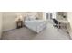 Cozy bedroom with neutral walls and plush carpeting, featuring a comfortable bed and a well-lit study area at 3334 Peachtree Ne Rd # 608, Atlanta, GA 30326
