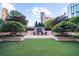 Beautifully landscaped courtyard with city views and outdoor seating for residents at 3334 Peachtree Ne Rd # 608, Atlanta, GA 30326