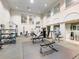 Brightly lit gym with a variety of equipment to meet your workout needs at 3334 Peachtree Ne Rd # 608, Atlanta, GA 30326