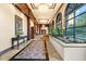 Bright hallway with large windows, fountain, and decorative plants at 3334 Peachtree Ne Rd # 608, Atlanta, GA 30326