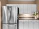 Kitchen detail with stainless steel refrigerator and ample cabinet space at 3334 Peachtree Ne Rd # 608, Atlanta, GA 30326