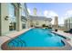 Luxurious outdoor pool with inviting lounge chairs and a beautiful building backdrop with high rise towers in the distance at 3334 Peachtree Ne Rd # 608, Atlanta, GA 30326