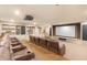 Home theater room with tiered seating, projector, and custom built-ins for immersive entertainment at 3334 Peachtree Ne Rd # 608, Atlanta, GA 30326