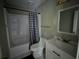 Modern bathroom featuring tiled shower and tub combination, toilet and a vanity with light countertop at 3832 Natalie Way, Ellenwood, GA 30294
