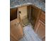Innovative kitchen storage solution: a corner cabinet with a lazy Susan for easy access and organization at 3832 Natalie Way, Ellenwood, GA 30294