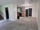 Spacious living room next to the kitchen with a view of hardwood floors at 3832 Natalie Way, Ellenwood, GA 30294