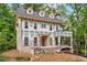 Elegant home exterior under construction, featuring classic architectural details and brickwork at 1176 Lullwater Ne Rd, Atlanta, GA 30307