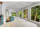 Open living area with large windows and beams, offering lots of natural light at 1176 Lullwater Ne Rd, Atlanta, GA 30307