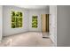 Bright room with ample natural light from the windows, adjacent to a walk-in closet at 1176 Lullwater Ne Rd, Atlanta, GA 30307