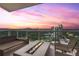 Relaxing balcony with a modern fire pit and comfortable seating, perfect for enjoying the stunning city skyline at 2881 Peachtree Ne Rd # 2304, Atlanta, GA 30305