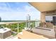 Relaxing balcony with a comfortable seating area and a modern fire pit, showcasing beautiful city views at 2881 Peachtree Ne Rd # 2304, Atlanta, GA 30305
